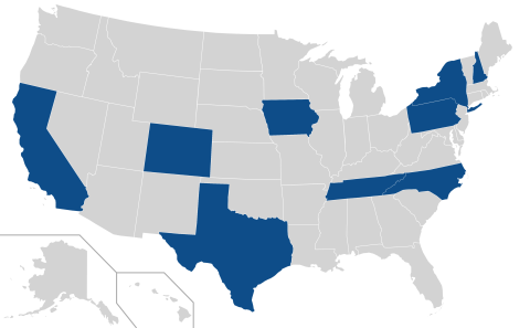 A grey map of the Unite States with the following states shaded in blue: California, Colorado, Texas, Iowa, Tennessee, North Carolina, New York, and New Hampshire